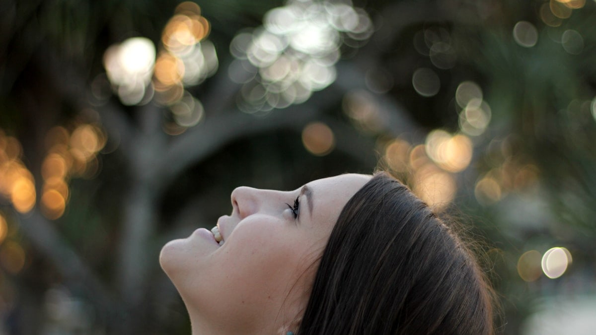woman looking at the sky during day